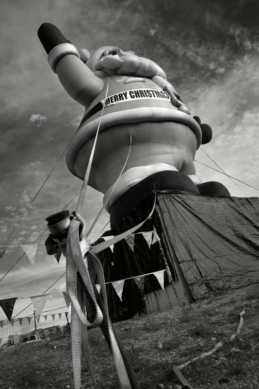 Black and White image of giant inflatable Santa, AZ 