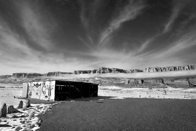 Black and White image of  old structure on Navajo reservation during winter near Marble Canyon, AZ